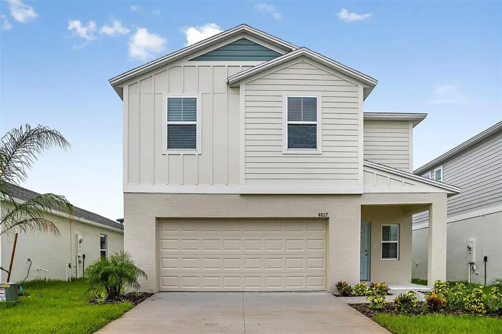 Front exterior of a new home in Bradbury Creek, Haines City, FL, highlighting curb appeal (Image 1). Front exterior of a new home in Bradbury Creek, Haines City, FL, highlighting curb appeal (Image 1).