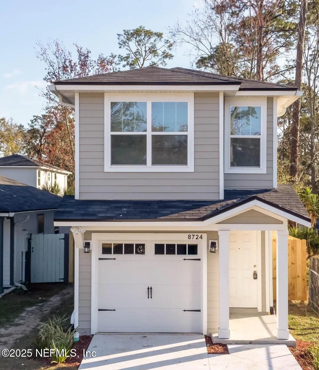 Front exterior of a new home in , Jacksonville, FL, highlighting curb appeal (Image 1). Front exterior of a new home in , Jacksonville, FL, highlighting curb appeal (Image 1).