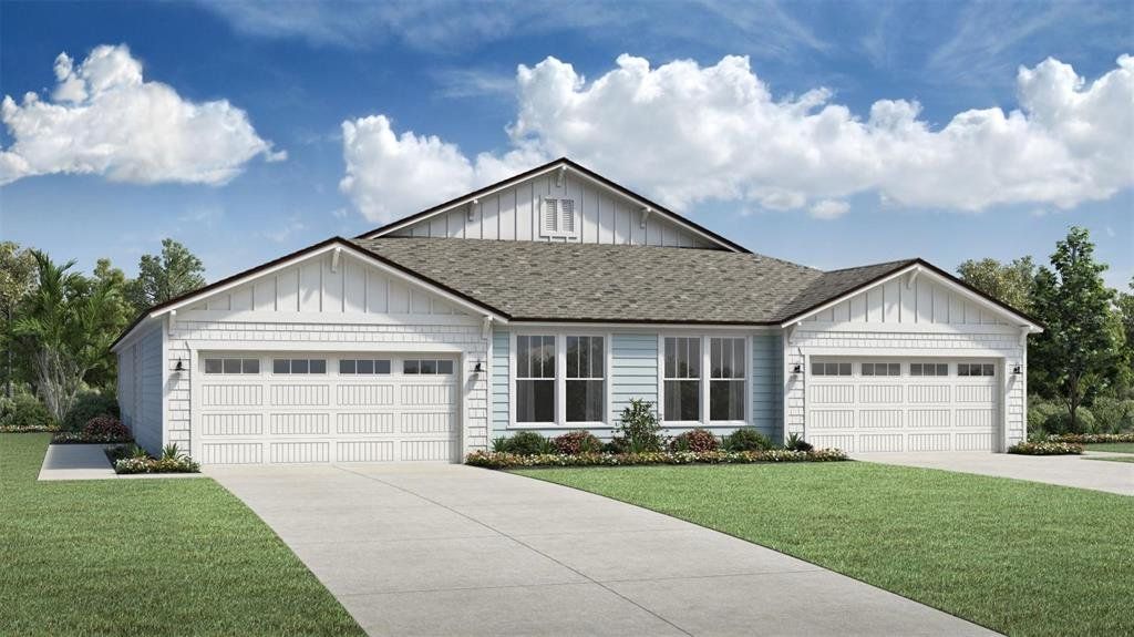 Front exterior of a new home in , Palm Coast, FL, highlighting curb appeal (Image 1).