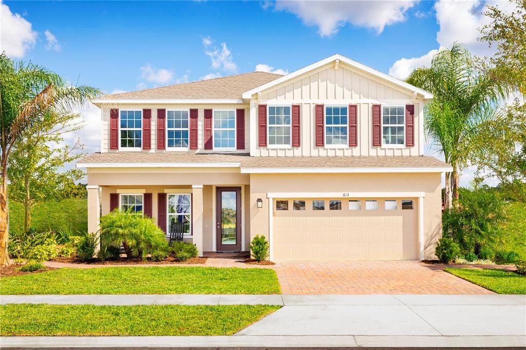 Front exterior of a new home in Hammock Oaks, Lady Lake, FL, highlighting curb appeal (Image 1). Front exterior of a new home in Hammock Oaks, Lady Lake, FL, highlighting curb appeal (Image 1).