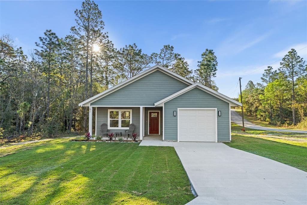 Front exterior of a new home in , Williston, FL, highlighting curb appeal (Image 1). Front exterior of a new home in , Williston, FL, highlighting curb appeal (Image 1).