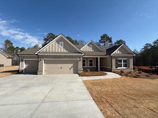 Front exterior of a new home in Belle Woode Estates, Monroe, GA, highlighting curb appeal (Image 1).