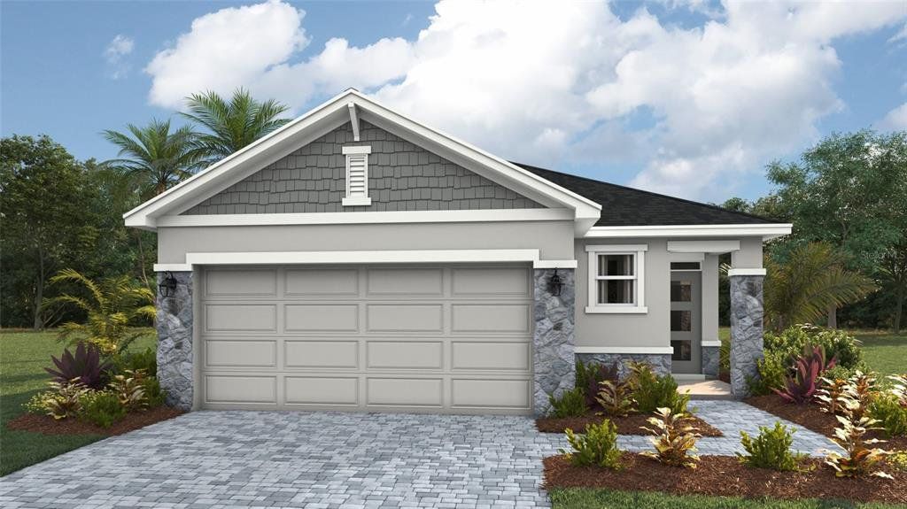 Front exterior of a new home in Legacy Preserve, Parrish, FL, highlighting curb appeal (Image 1). Front exterior of a new home in Legacy Preserve, Parrish, FL, highlighting curb appeal (Image 1).