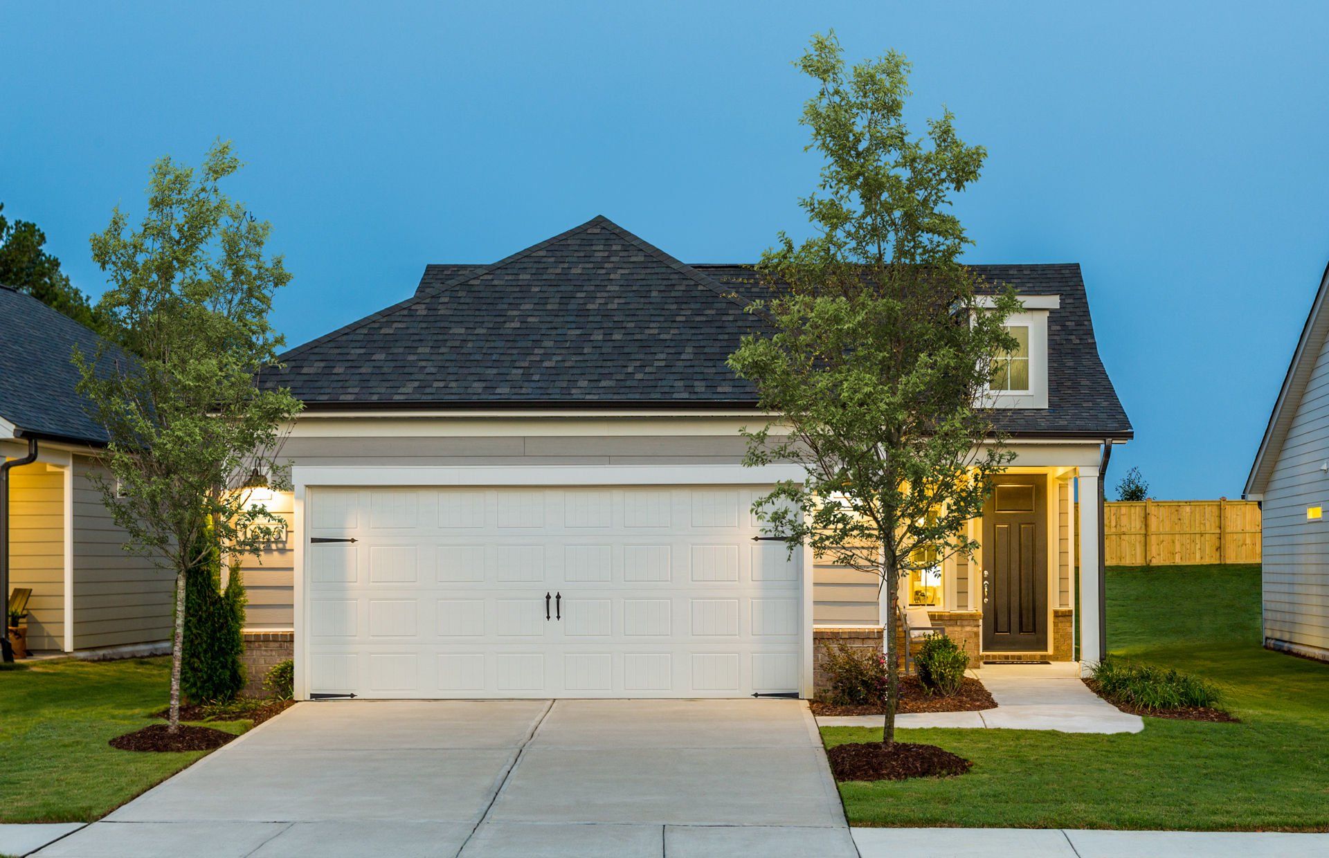 Front exterior of a new home in Del Webb Savannah at Heartwood, Richmond Hill, GA, highlighting curb appeal (Image 1).