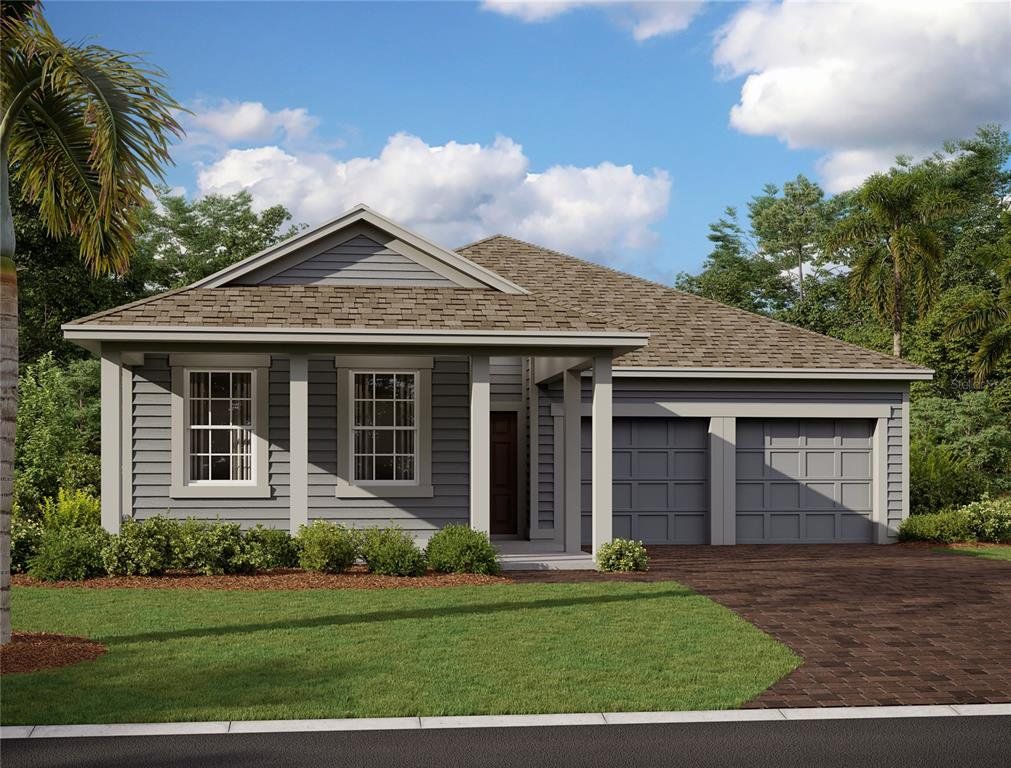 Front exterior of a new home in Trailside, Mount Dora, FL, highlighting curb appeal (Image 1). Front exterior of a new home in Trailside, Mount Dora, FL, highlighting curb appeal (Image 1).
