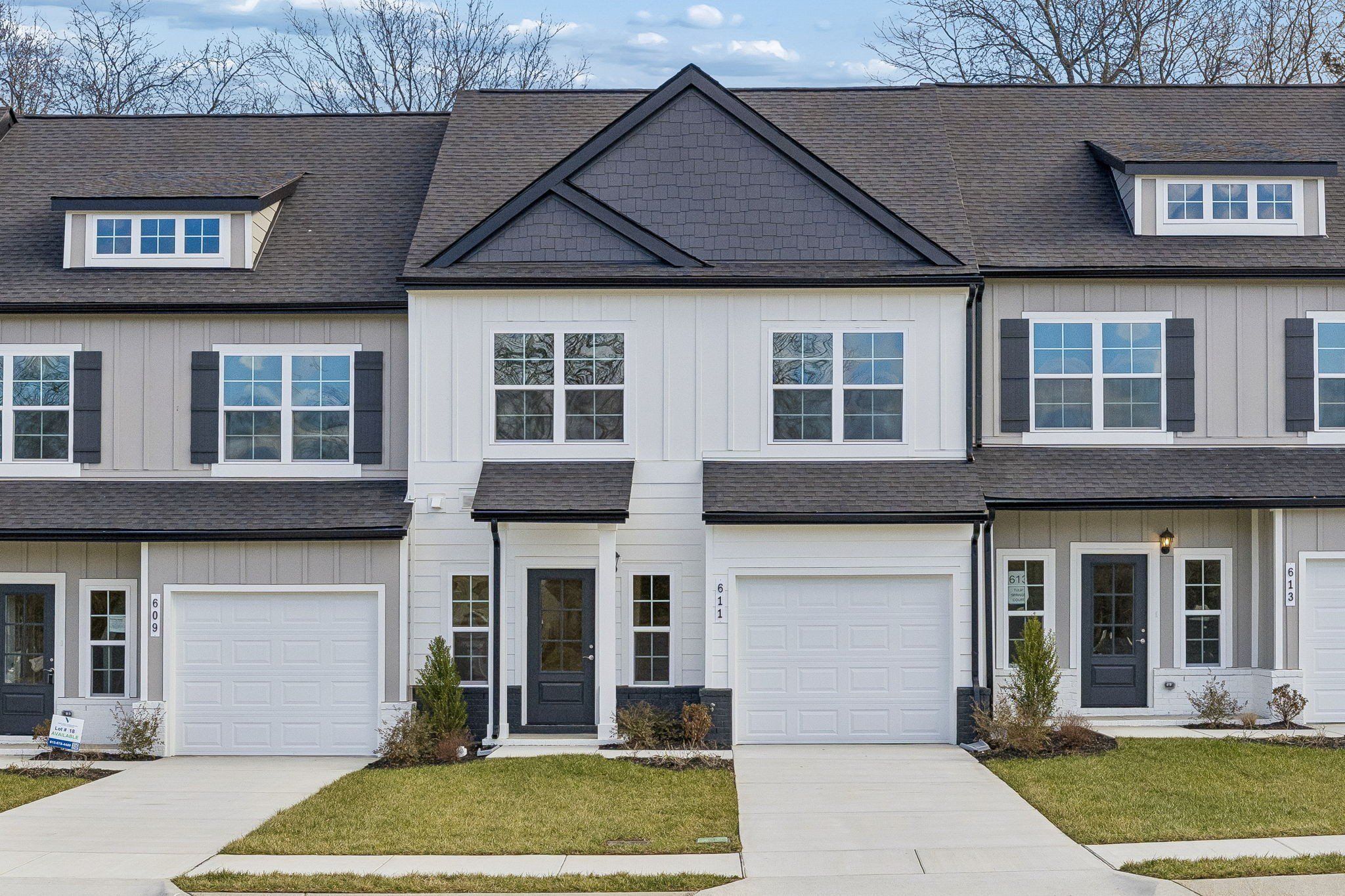 Front exterior of a new home in Tulip Springs, Hermitage, TN, highlighting curb appeal (Image 1). Front exterior of a new home in Tulip Springs, Hermitage, TN, highlighting curb appeal (Image 1).