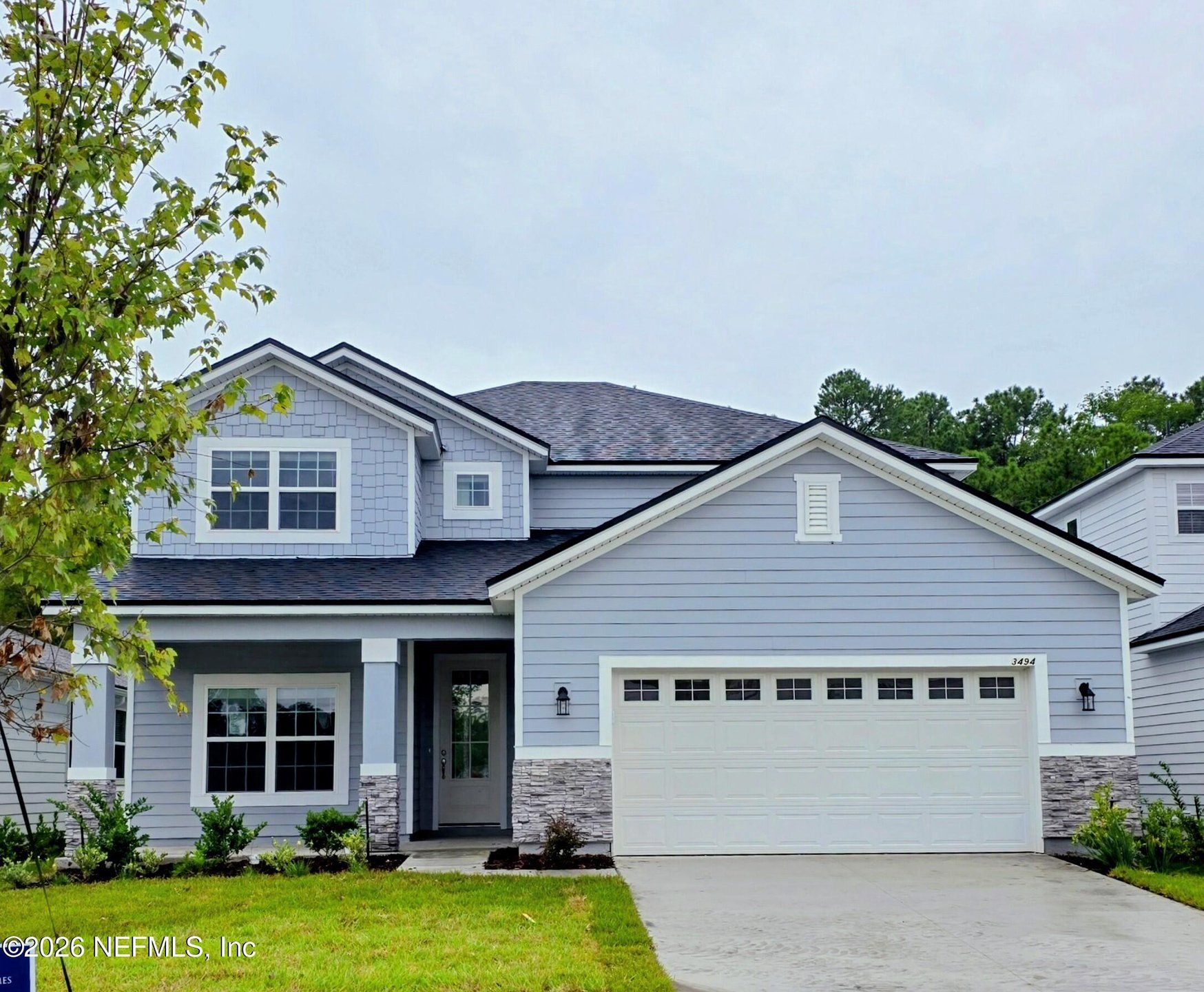 Front exterior of a new home in , Orange Park, FL, highlighting curb appeal (Image 1). Front exterior of a new home in , Orange Park, FL, highlighting curb appeal (Image 1).