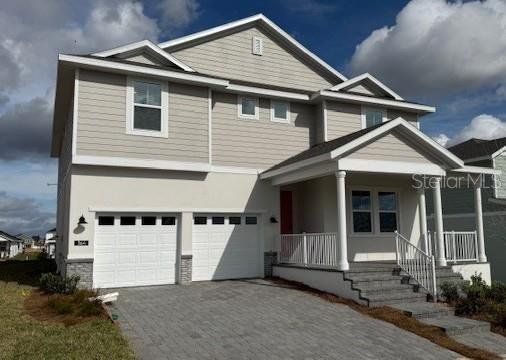 Front exterior of a new home in Cypress Bluff, Groveland, FL, highlighting curb appeal (Image 1). Front exterior of a new home in Cypress Bluff, Groveland, FL, highlighting curb appeal (Image 1).