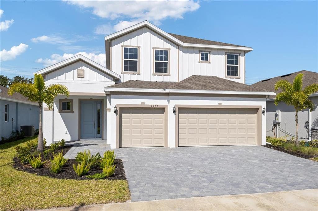 Front exterior of a new home in Brighton, Venice, FL, highlighting curb appeal (Image 1). Front exterior of a new home in Brighton, Venice, FL, highlighting curb appeal (Image 1).