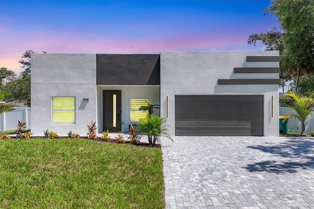 Front exterior of a new home in , Port Charlotte, FL, highlighting curb appeal (Image 1). Front exterior of a new home in , Port Charlotte, FL, highlighting curb appeal (Image 1).