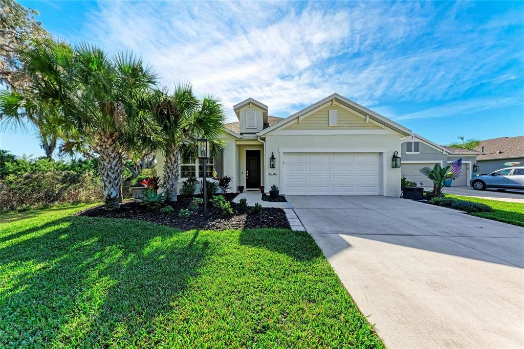 Front exterior of a new home in , Parrish, FL, highlighting curb appeal (Image 1). Front exterior of a new home in , Parrish, FL, highlighting curb appeal (Image 1).