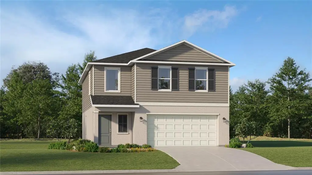 Front exterior of a new home in Heath Preserve: Heath Preserve - The Enclave, Ocala, FL, highlighting curb appeal (Image 1).