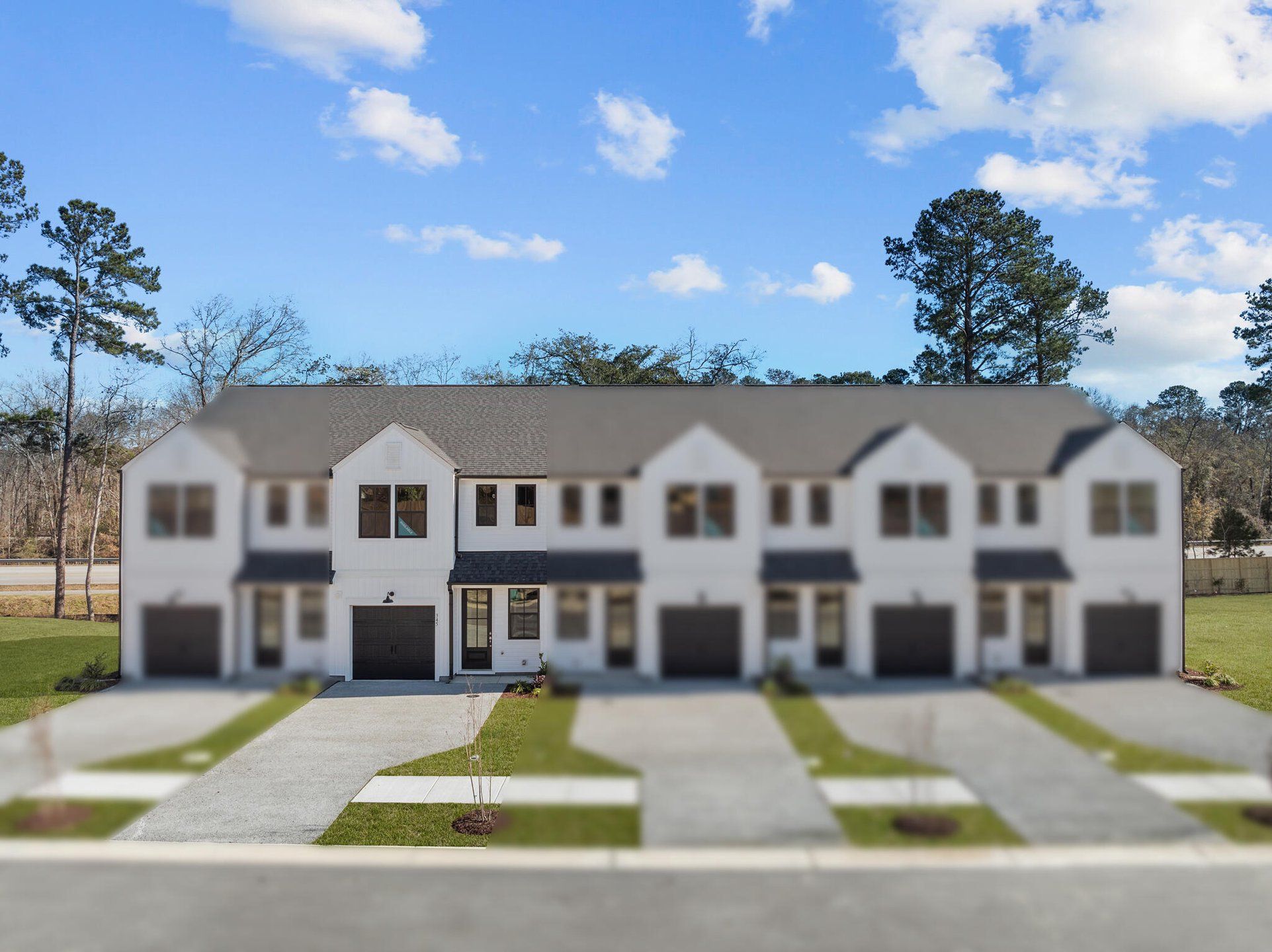 Front exterior of a new home in Windward Townes, Goose Creek, SC, highlighting curb appeal (Image 1). Front exterior of a new home in Windward Townes, Goose Creek, SC, highlighting curb appeal (Image 1).