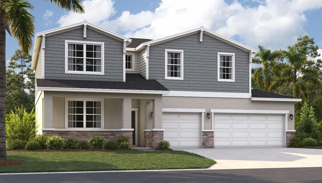 Front exterior of a new home in Groves at Grand Island, Grand Island, FL, highlighting curb appeal (Image 1). Front exterior of a new home in Groves at Grand Island, Grand Island, FL, highlighting curb appeal (Image 1).