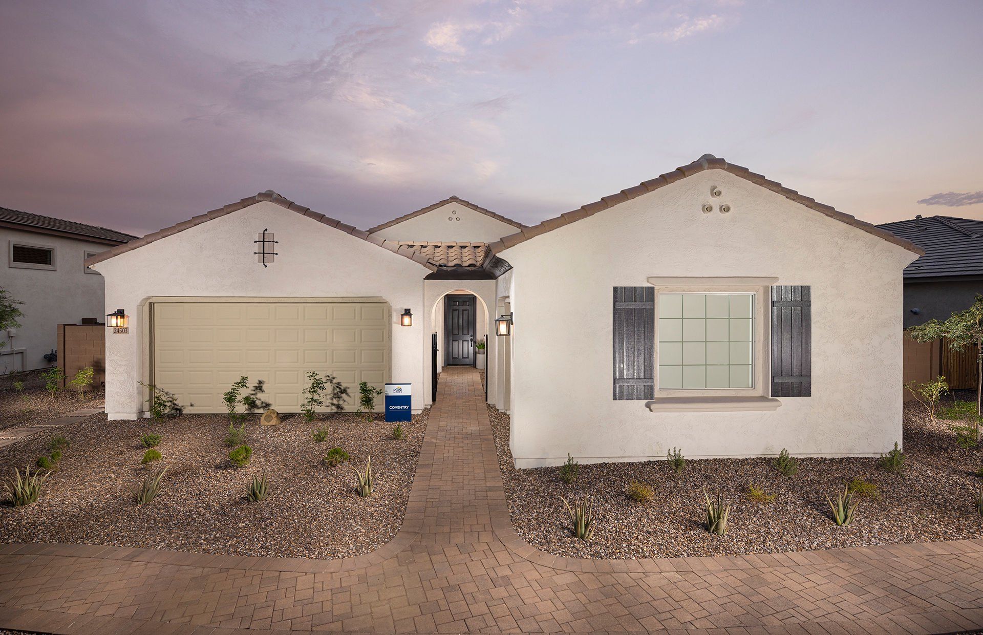 Front exterior of a new home in Artisan at Asante, Surprise, AZ, highlighting curb appeal (Image 1). Front exterior of a new home in Artisan at Asante, Surprise, AZ, highlighting curb appeal (Image 1).