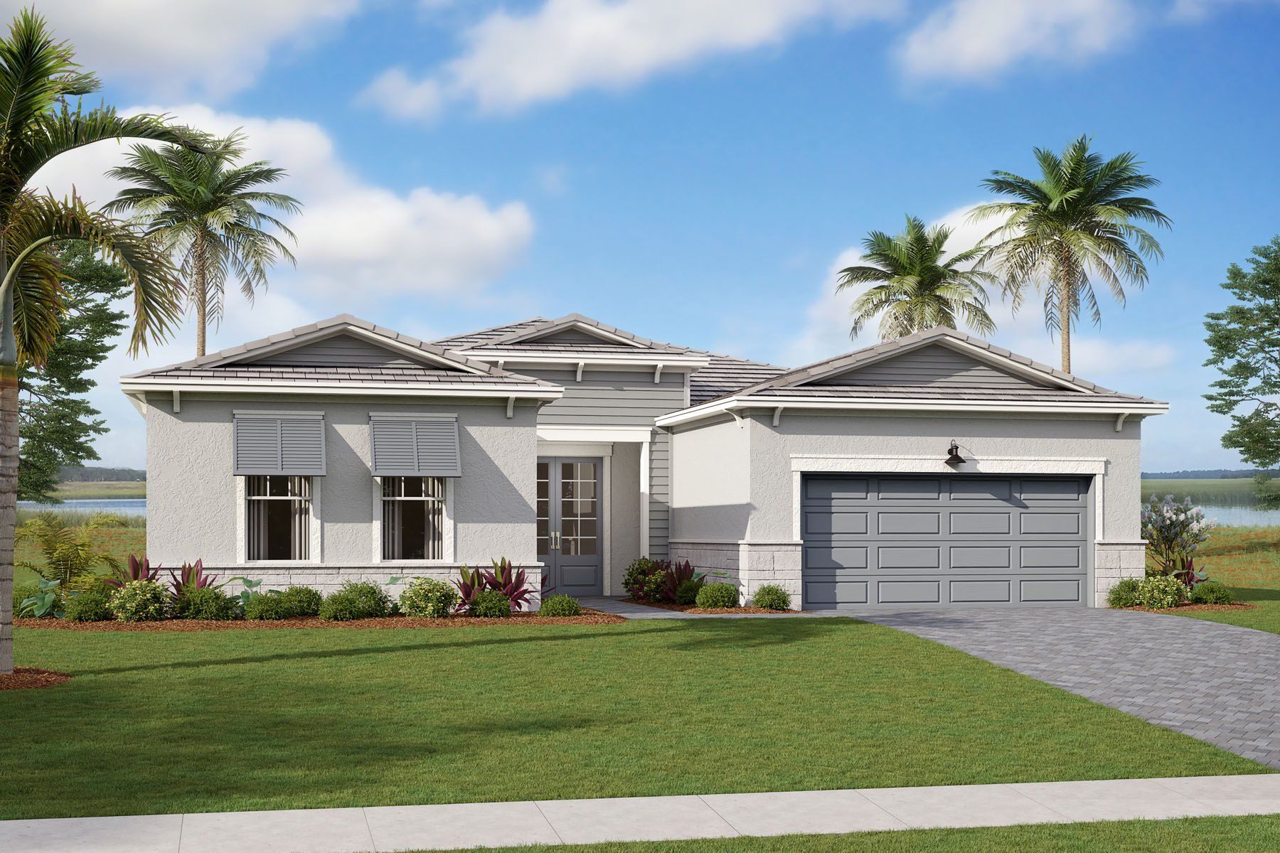 Front exterior of a new home in Tradition - Telaro, Port St. Lucie, FL, highlighting curb appeal (Image 1).