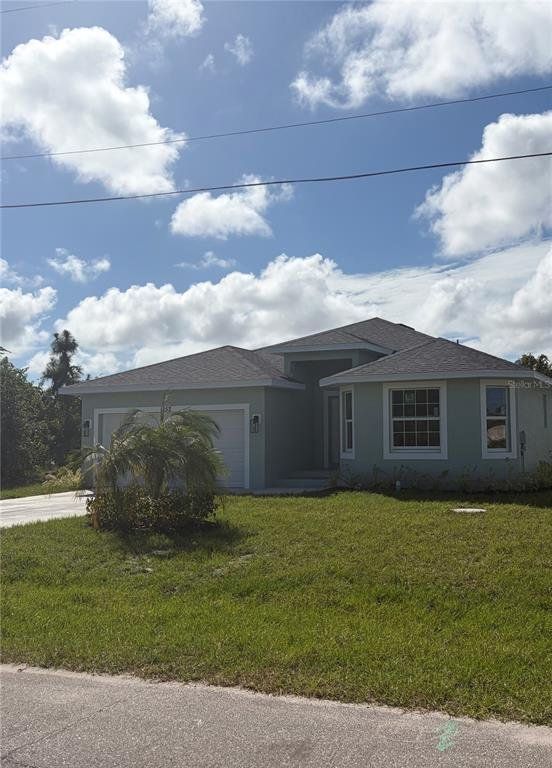 Front exterior of a new home in , Rotonda West, FL, highlighting curb appeal (Image 1). Front exterior of a new home in , Rotonda West, FL, highlighting curb appeal (Image 1).