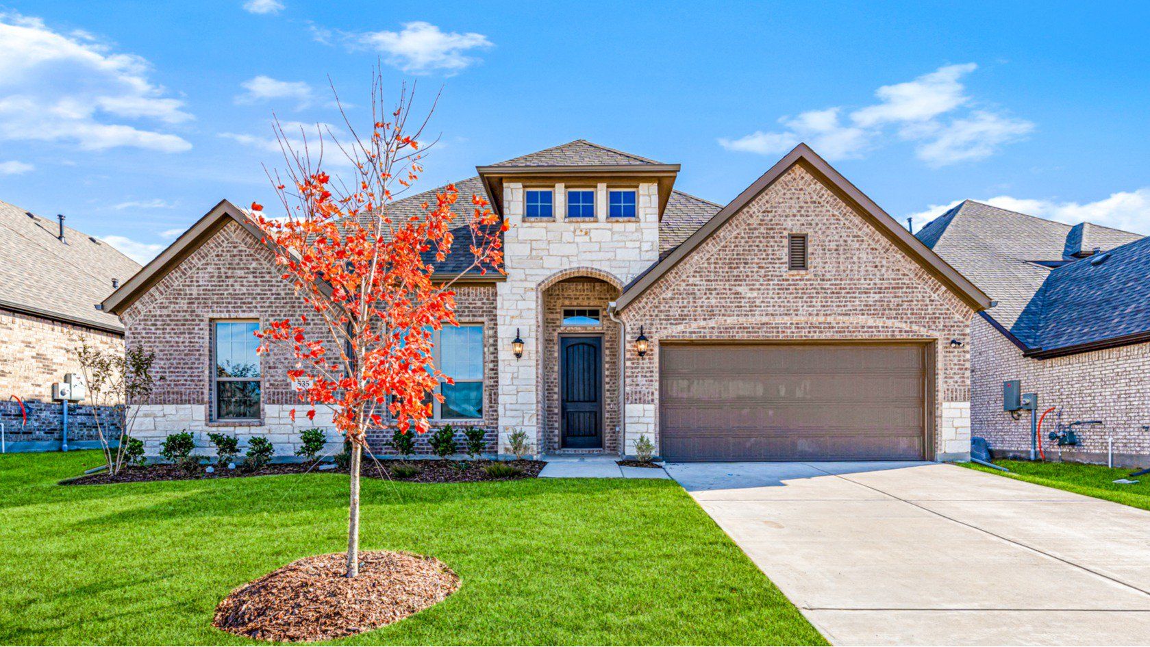 Front exterior of a new home in Forest Ridge Estates, Greenville, TX, highlighting curb appeal (Image 1). Front exterior of a new home in Forest Ridge Estates, Greenville, TX, highlighting curb appeal (Image 1).