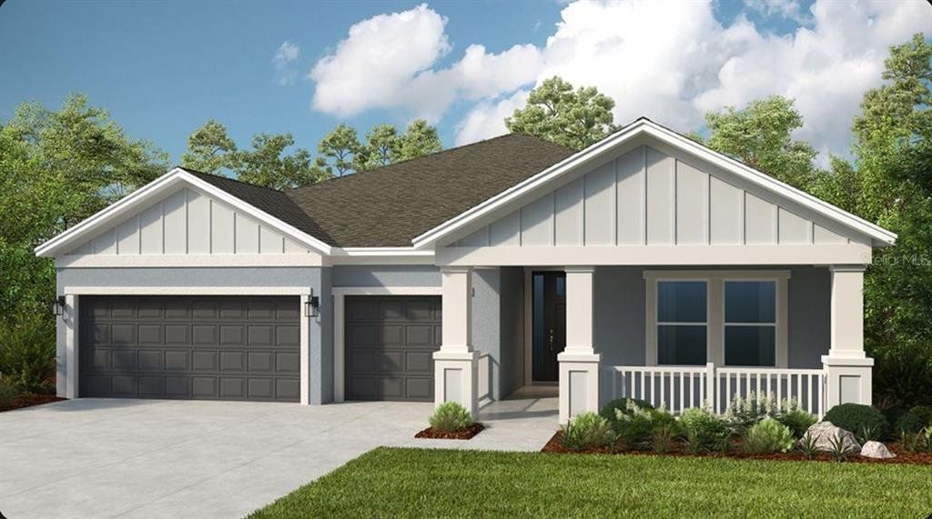 Front exterior of a new home in Ardisia Park, New Smyrna Beach, FL, highlighting curb appeal (Image 1). Front exterior of a new home in Ardisia Park, New Smyrna Beach, FL, highlighting curb appeal (Image 1).
