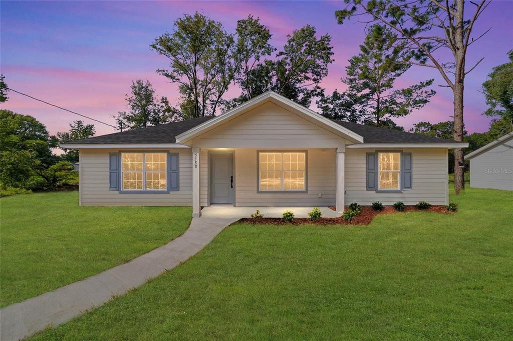 Front exterior of a new home in , Ocala, FL, highlighting curb appeal (Image 1). Front exterior of a new home in , Ocala, FL, highlighting curb appeal (Image 1).