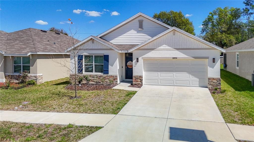Front exterior of a new home in , San Antonio, FL, highlighting curb appeal (Image 1). Front exterior of a new home in , San Antonio, FL, highlighting curb appeal (Image 1).