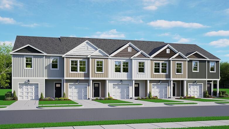 Front exterior of a new home in The Crossing at St. James, Goose Creek, SC, highlighting curb appeal (Image 1). Front exterior of a new home in The Crossing at St. James, Goose Creek, SC, highlighting curb appeal (Image 1).
