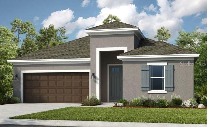 Front exterior of a new home in Indigo Creek, Apollo Beach, FL, highlighting curb appeal (Image 1). Front exterior of a new home in Indigo Creek, Apollo Beach, FL, highlighting curb appeal (Image 1).