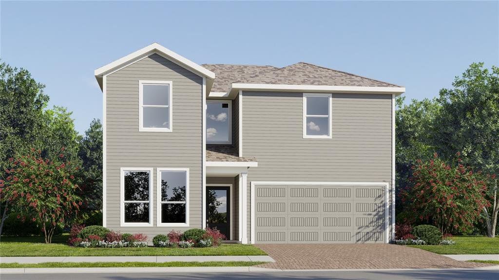 Front exterior of a new home in The Glades at Crossprairie, St. Cloud, FL, highlighting curb appeal (Image 1). Front exterior of a new home in The Glades at Crossprairie, St. Cloud, FL, highlighting curb appeal (Image 1).