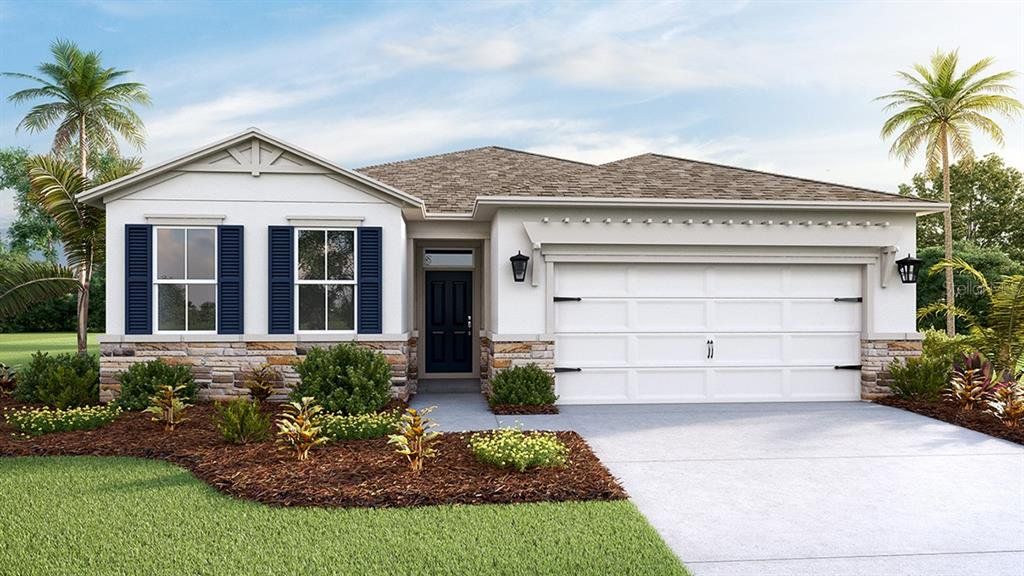 Front exterior of a new home in Twisted Oaks, Wildwood, FL, highlighting curb appeal (Image 1).