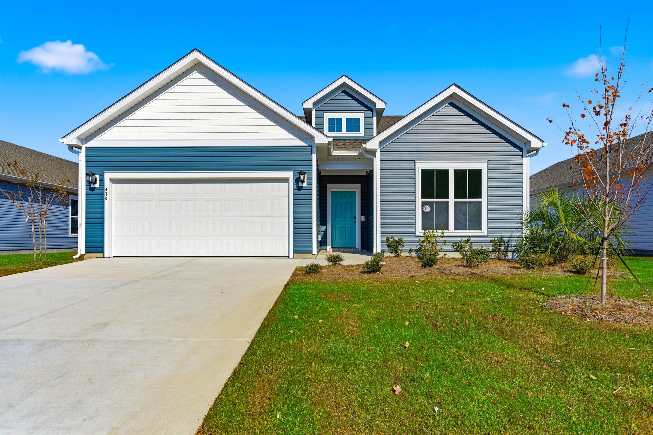 Front exterior of a new home in Sunset Landing, Little River, SC, highlighting curb appeal (Image 1).