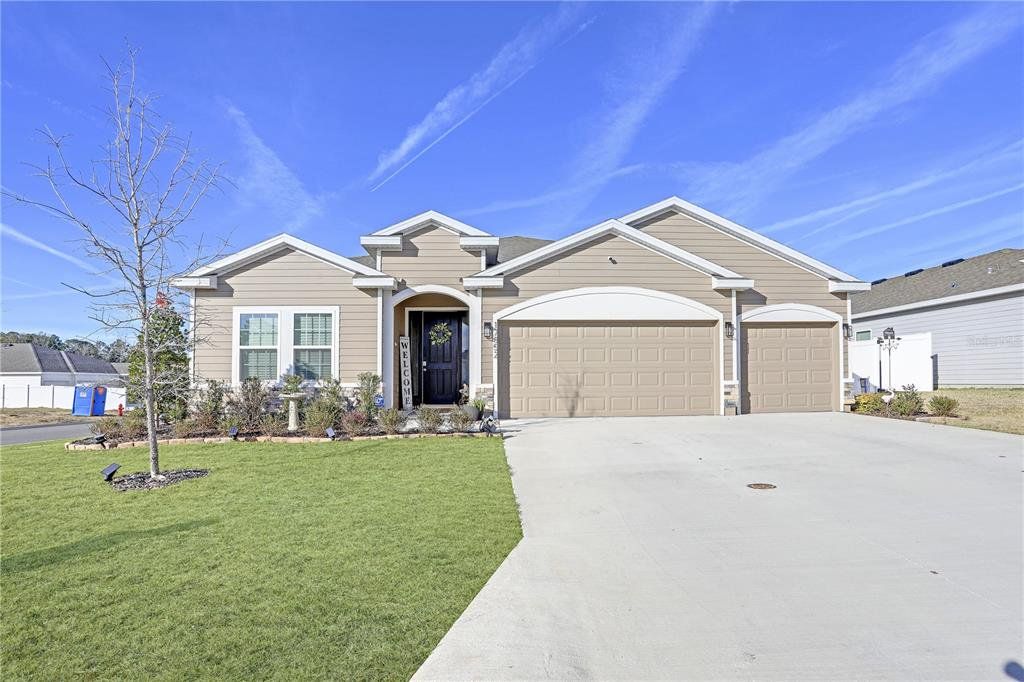 Front exterior of a new home in Briarwood, Alachua, FL, highlighting curb appeal (Image 1). Front exterior of a new home in Briarwood, Alachua, FL, highlighting curb appeal (Image 1).