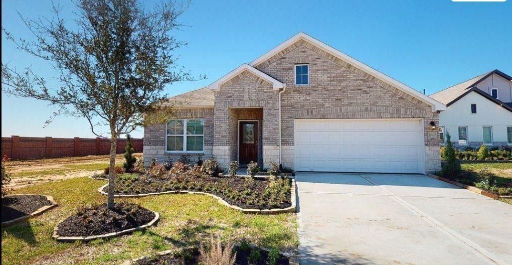 Front exterior of a new home in Rollingbrook Estates, Baytown, TX, highlighting curb appeal (Image 1). Front exterior of a new home in Rollingbrook Estates, Baytown, TX, highlighting curb appeal (Image 1).