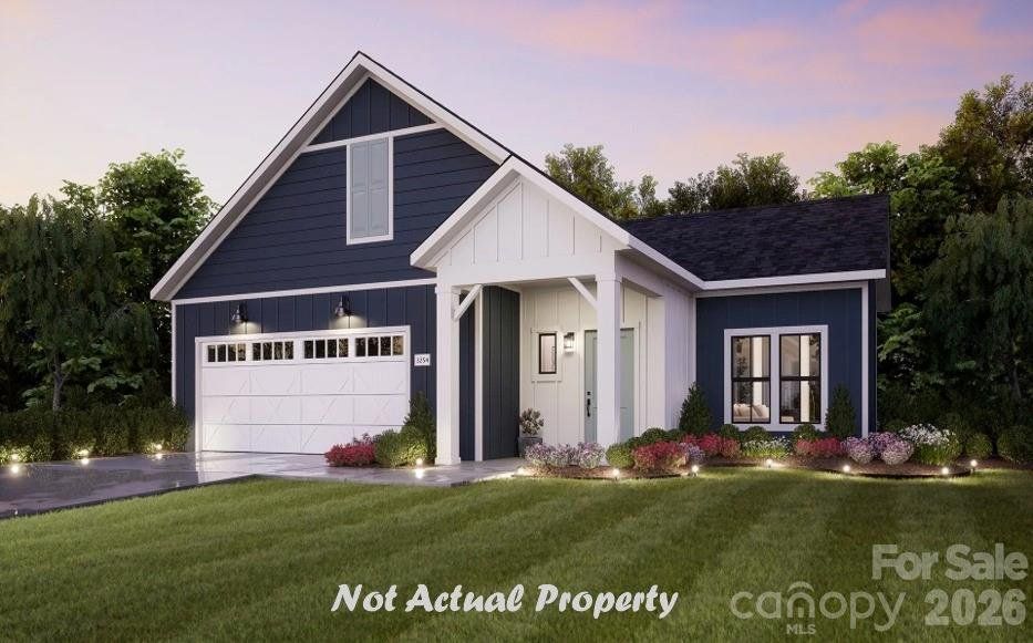 Front exterior of a new home in , Huntersville, NC, highlighting curb appeal (Image 1). Front exterior of a new home in , Huntersville, NC, highlighting curb appeal (Image 1).