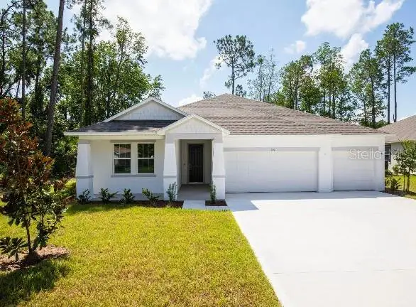 Front exterior of a new home in Applewood Reserve, Lakeland, FL, highlighting curb appeal (Image 1). Front exterior of a new home in Applewood Reserve, Lakeland, FL, highlighting curb appeal (Image 1).