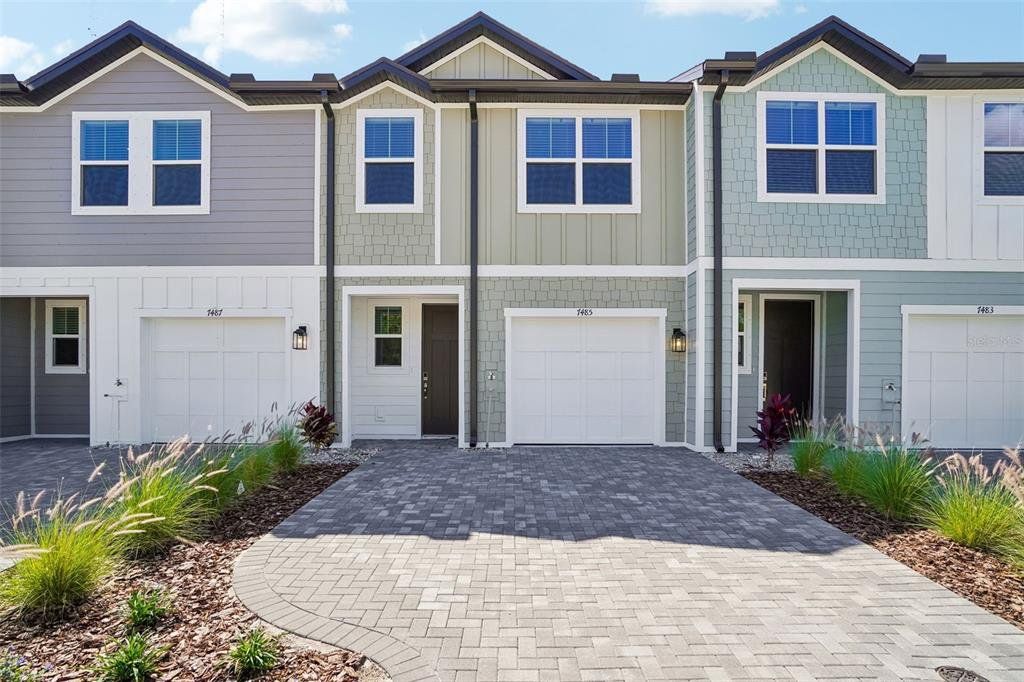 Front exterior of a new home in Montague Chase, Tampa, FL, highlighting curb appeal (Image 1). Front exterior of a new home in Montague Chase, Tampa, FL, highlighting curb appeal (Image 1).