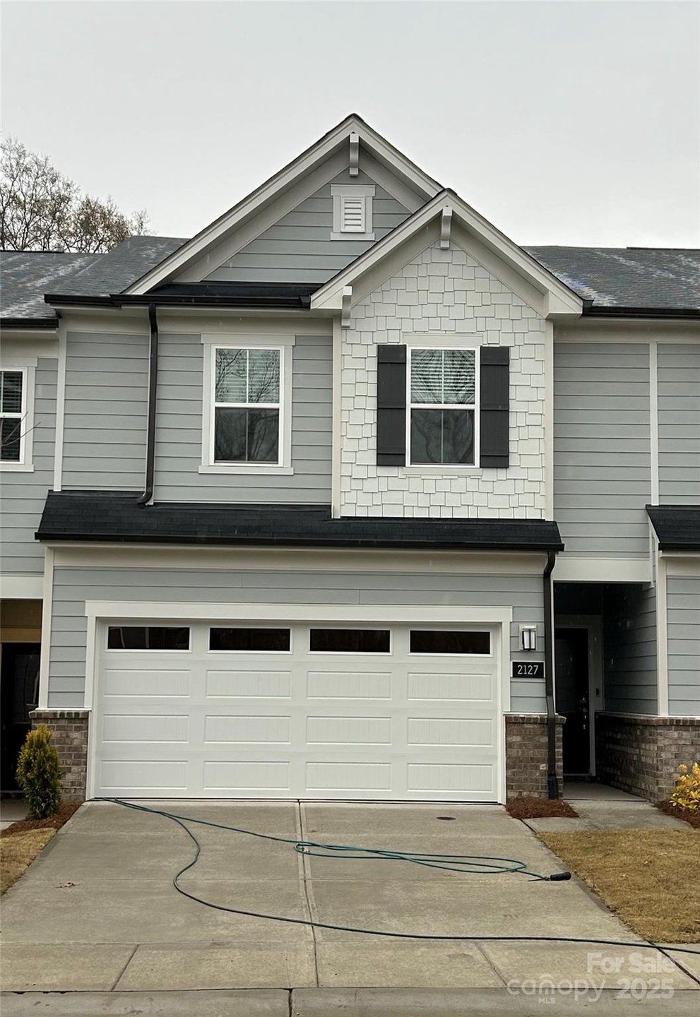 Front exterior of a new home in Galloway Towns, Charlotte, NC, highlighting curb appeal (Image 1).