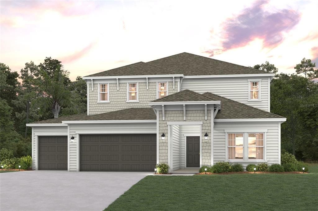 Front exterior of a new home in Reserve East, Flagler Beach, FL, highlighting curb appeal (Image 1). Front exterior of a new home in Reserve East, Flagler Beach, FL, highlighting curb appeal (Image 1).