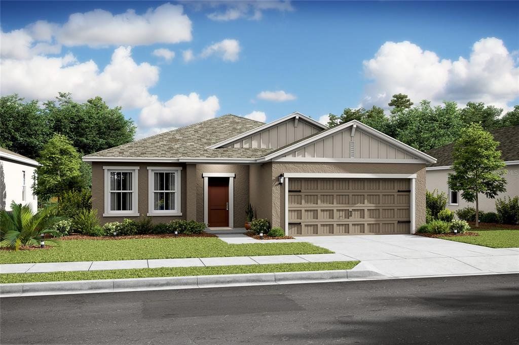 Front exterior of a new home in Aspire at Palm Coast, Palm Coast, FL, highlighting curb appeal (Image 1). Front exterior of a new home in Aspire at Palm Coast, Palm Coast, FL, highlighting curb appeal (Image 1).