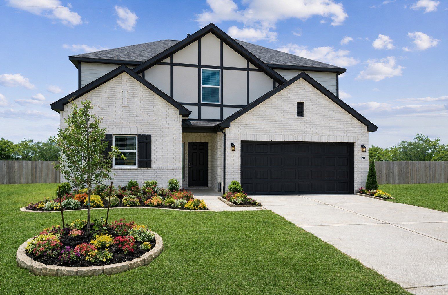Front exterior of a new home in Rollingbrook Estates, Baytown, TX, highlighting curb appeal (Image 1). Front exterior of a new home in Rollingbrook Estates, Baytown, TX, highlighting curb appeal (Image 1).