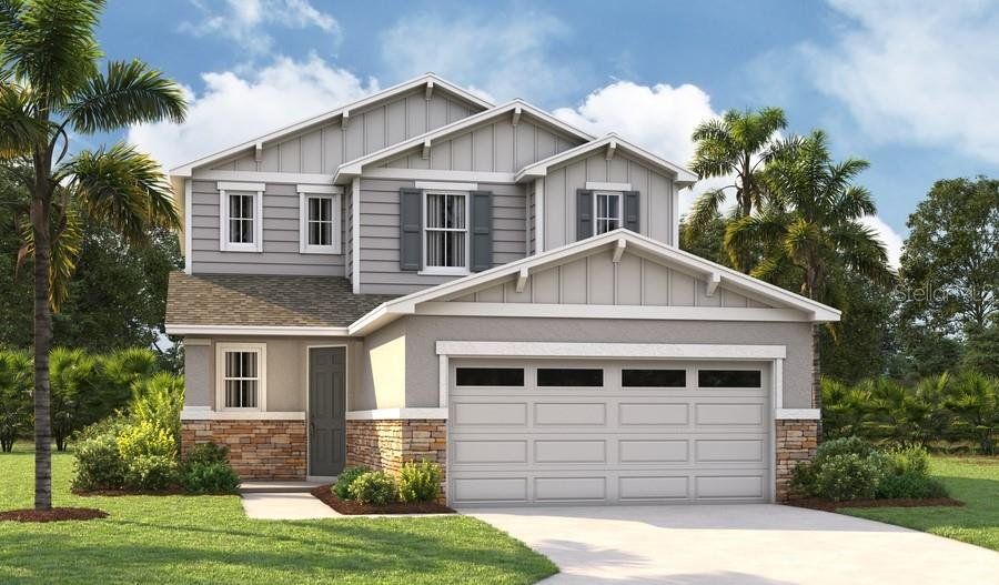 Front exterior of a new home in Seasons at Magnolia Pointe, Umatilla, FL, highlighting curb appeal (Image 1). Front exterior of a new home in Seasons at Magnolia Pointe, Umatilla, FL, highlighting curb appeal (Image 1).