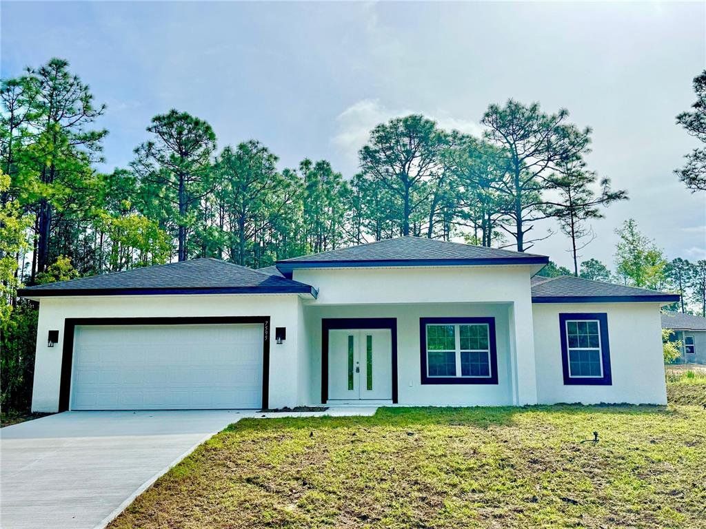 Front exterior of a new home in , Dunnellon, FL, highlighting curb appeal (Image 1). Front exterior of a new home in , Dunnellon, FL, highlighting curb appeal (Image 1).