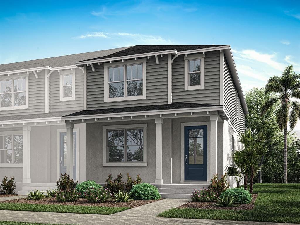 Front exterior of a new home in Hickory Grove, Winter Springs, FL, highlighting curb appeal (Image 1). Front exterior of a new home in Hickory Grove, Winter Springs, FL, highlighting curb appeal (Image 1).