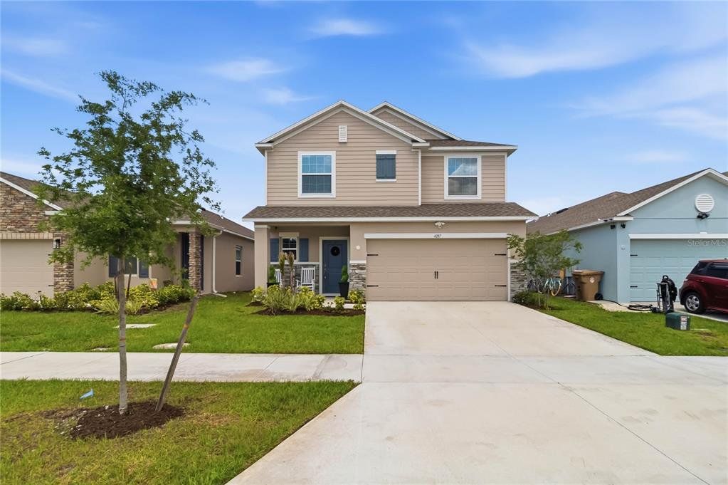 Front exterior of a new home in , St. Cloud, FL, highlighting curb appeal (Image 1). Front exterior of a new home in , St. Cloud, FL, highlighting curb appeal (Image 1).