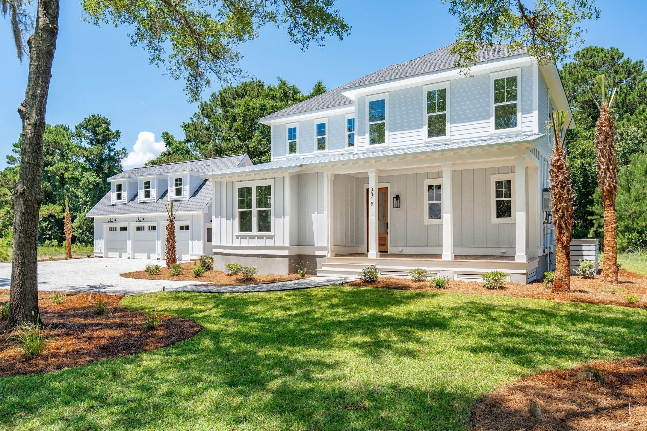 Front exterior of a new home in , Johns Island, SC, highlighting curb appeal (Image 1). Front exterior of a new home in , Johns Island, SC, highlighting curb appeal (Image 1).