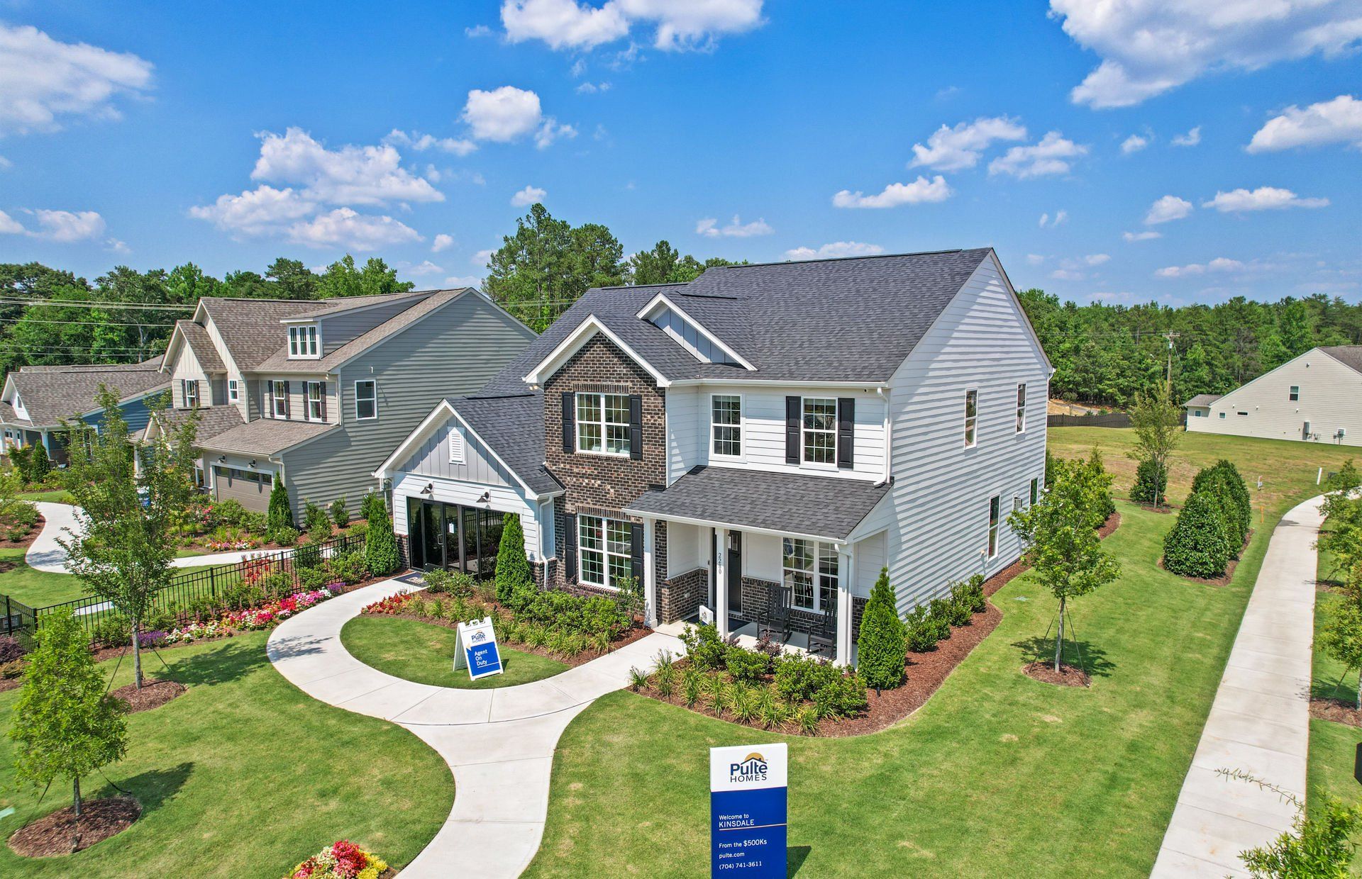Front exterior of a new home in Kinsdale, Lancaster, SC, highlighting curb appeal (Image 1). Front exterior of a new home in Kinsdale, Lancaster, SC, highlighting curb appeal (Image 1).
