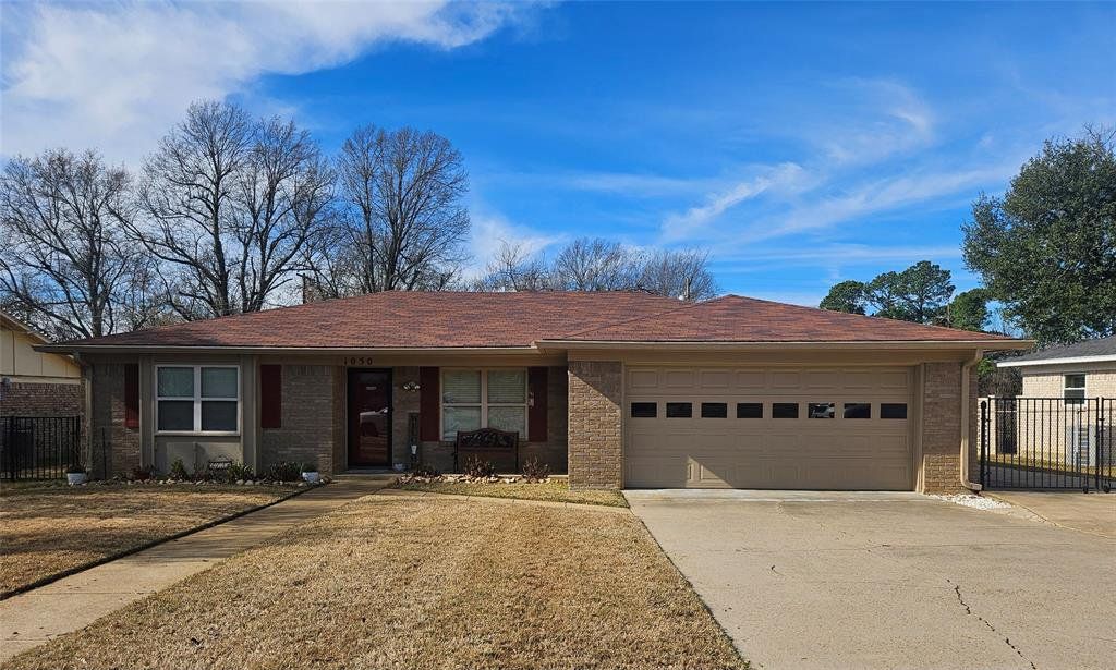 Front exterior of a new home in , Paris, TX, highlighting curb appeal (Image 1). Front exterior of a new home in , Paris, TX, highlighting curb appeal (Image 1).