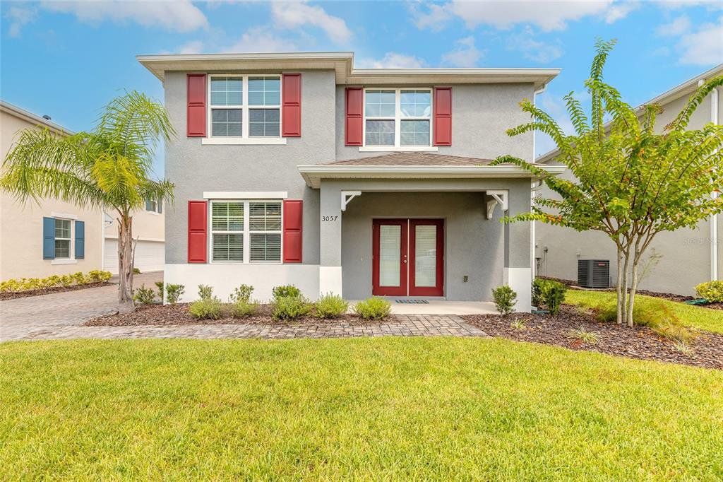 Front exterior of a new home in , New Smyrna Beach, FL, highlighting curb appeal (Image 1). Front exterior of a new home in , New Smyrna Beach, FL, highlighting curb appeal (Image 1).