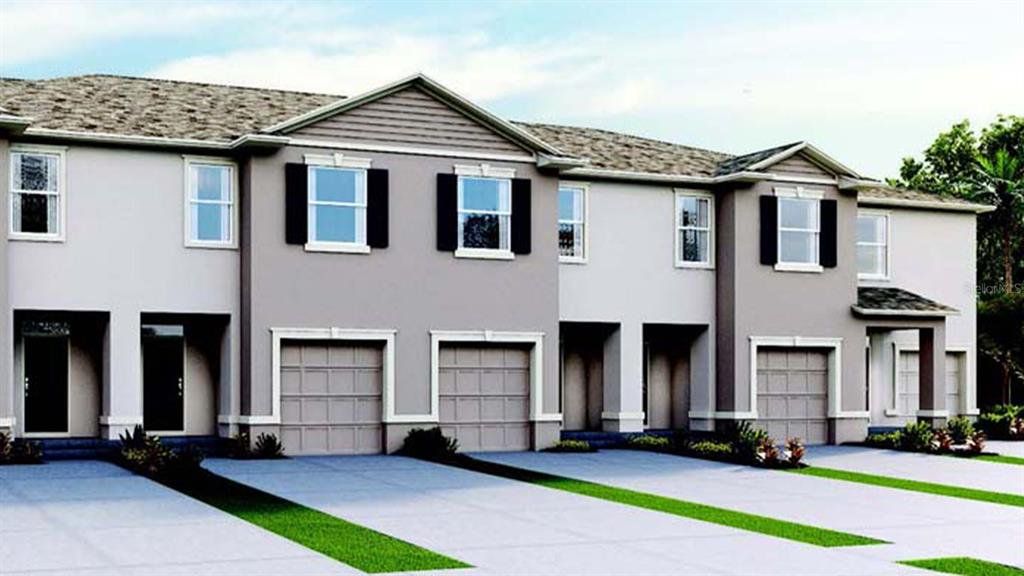 Front exterior of a new home in Harmony at Lake Eloise, Winter Haven, FL, highlighting curb appeal (Image 1). Front exterior of a new home in Harmony at Lake Eloise, Winter Haven, FL, highlighting curb appeal (Image 1).