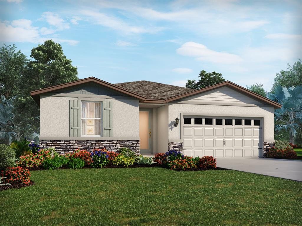 Front exterior of a new home in Springs at Lake Alfred - Signature Series, Lake Alfred, FL, highlighting curb appeal (Image 1). Front exterior of a new home in Springs at Lake Alfred - Signature Series, Lake Alfred, FL, highlighting curb appeal (Image 1).