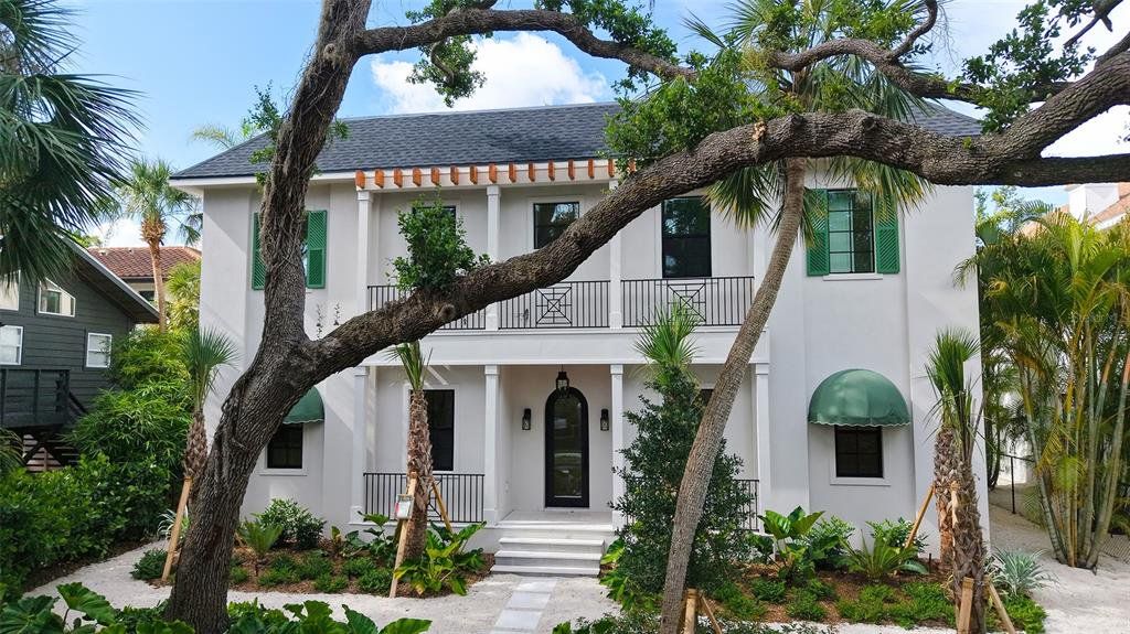 Front exterior of a new home in , Sarasota, FL, highlighting curb appeal (Image 1). Front exterior of a new home in , Sarasota, FL, highlighting curb appeal (Image 1).